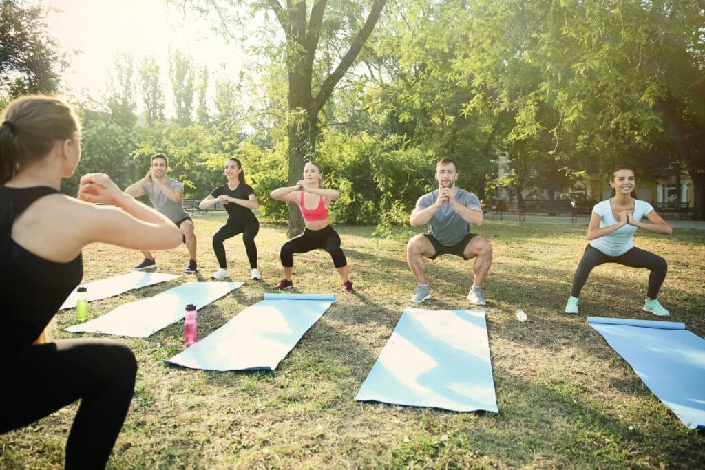group of people doing yoga in an outdoor setting highlighting the wide range of waiver usage Waiver Wire